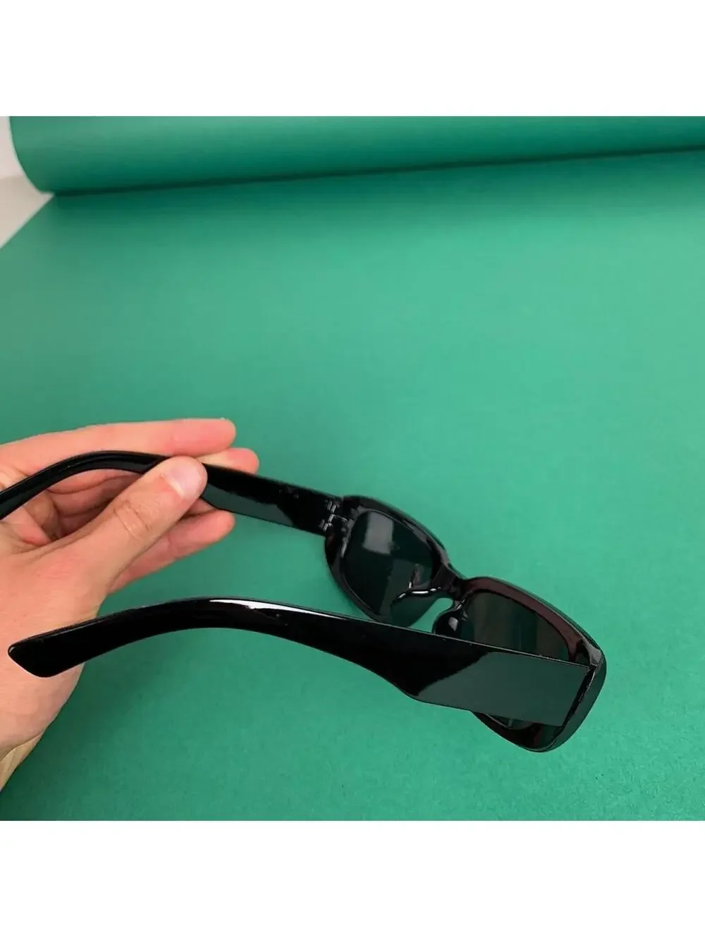 Minimalistic black sunglasses. UVA UVB protection